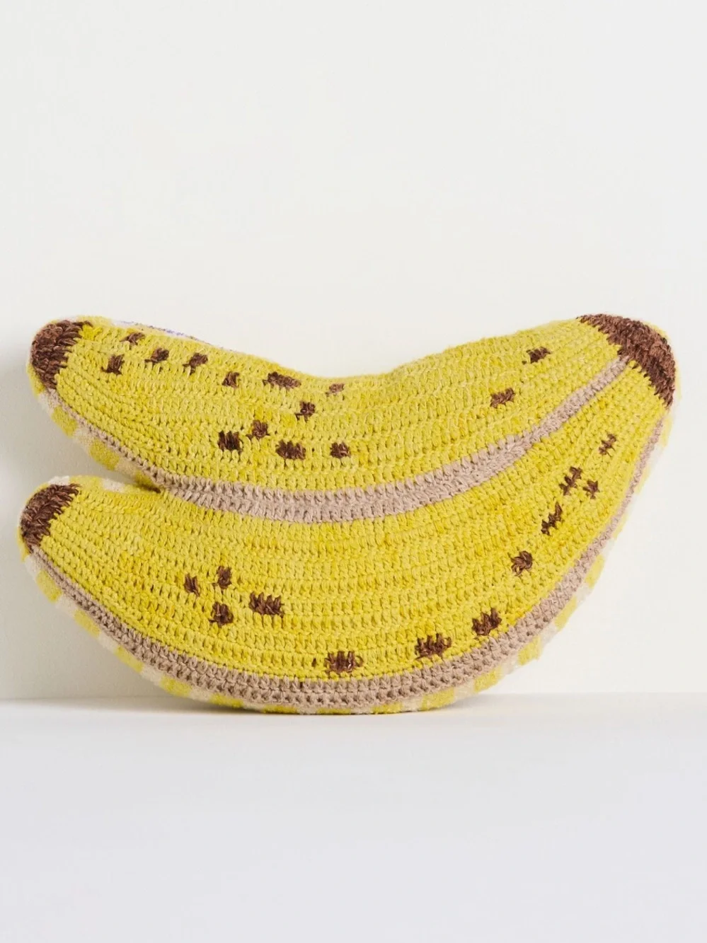 Woven Banana Pillow from Anthropologie.